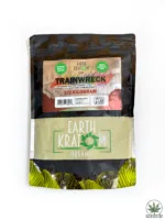 Clear resealable pouch of Earth Kratom Organics Trainwreck 1/2 kilogram kratom powder featuring green and red label with lab-tested and organic certification.
